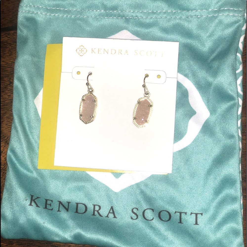 Kendra Scott Lee earrings.